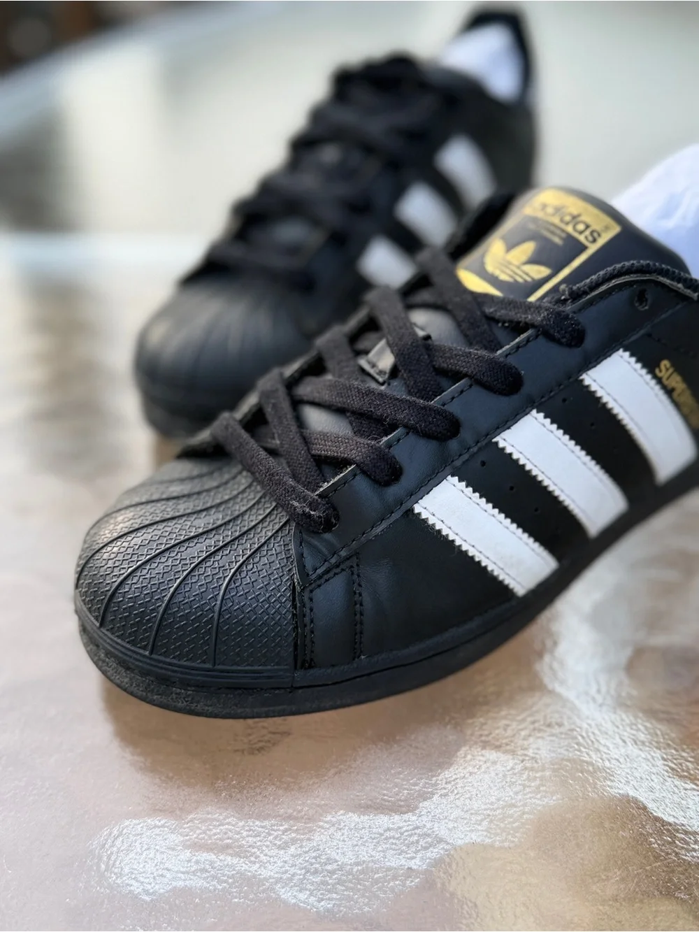adidas Black White Sneakers with Gold Logo Accent